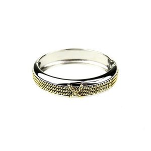 Metal oval with twist X design hinged bangle in Antique 2 tone Gold/Rhodium